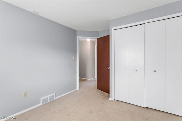 6480 State Rd Unit F7, Parma, OH 44134 - unfurnished bedroom with light carpet and a closet