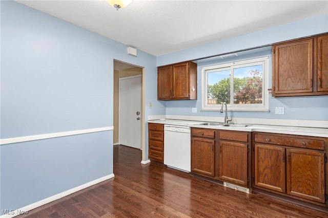6480 State Rd Unit F7, Parma, OH 44134 - kitchen with white dishwasher, brown cabinets, dark wood finished floors, and light countertops