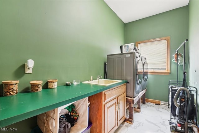 1101 Partridge Dr, Wadsworth, OH 44281 - washroom with washing machine and clothes dryer and light marble finish flooring