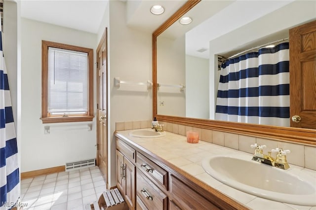 1101 Partridge Dr, Wadsworth, OH 44281 - full bath featuring double vanity and recessed lighting