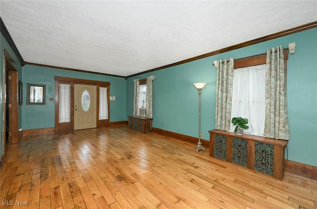 517 Broad Ave NW, Canton, OH 44708 - entryway with hardwood / wood-style flooring and crown molding