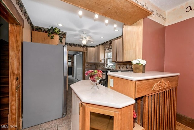 517 Broad Ave NW, Canton, OH 44708 - kitchen with freestanding refrigerator, a ceiling fan, light countertops, and recessed lighting