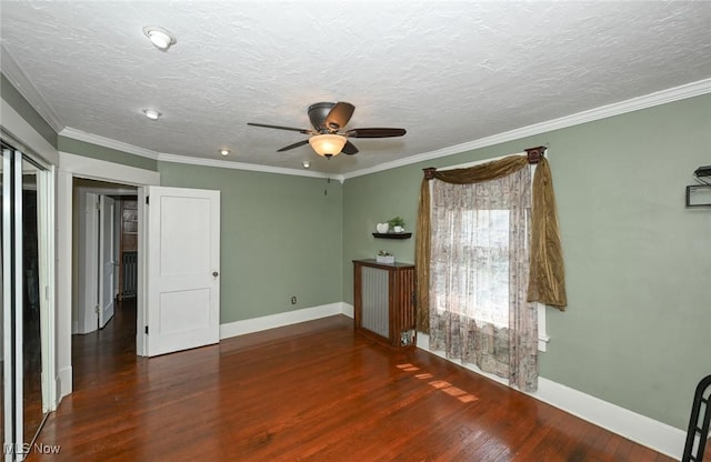 517 Broad Ave NW, Canton, OH 44708 - empty room featuring ceiling fan, wood finished floors, a textured ceiling, and ornamental molding
