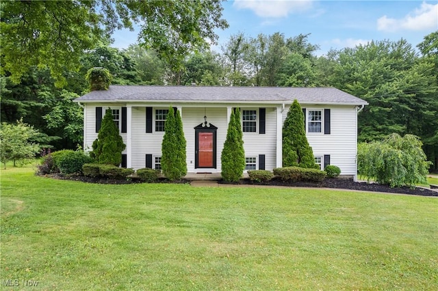 254 Eastern Rd, Doylestown, OH 44230 - raised ranch featuring a chimney and a front lawn