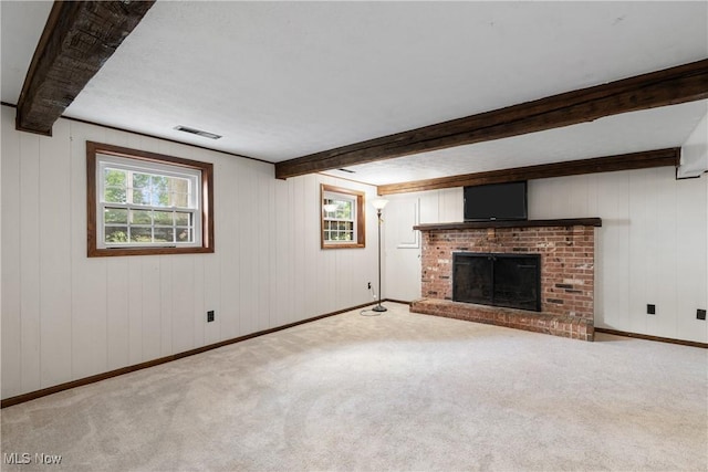 254 Eastern Rd, Doylestown, OH 44230 - unfurnished living room featuring beamed ceiling, a brick fireplace, carpet floors, and wood walls