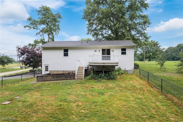 254 Eastern Rd, Doylestown, OH 44230 - back of house featuring a wooden deck, a fenced backyard, and stairs
