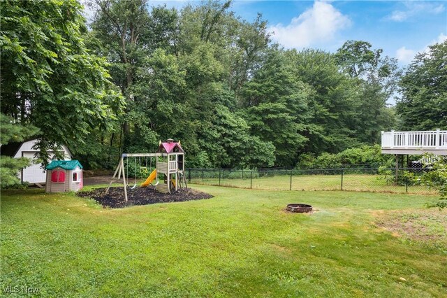 254 Eastern Rd, Doylestown, OH 44230 - view of yard featuring a playground and an outdoor fire pit