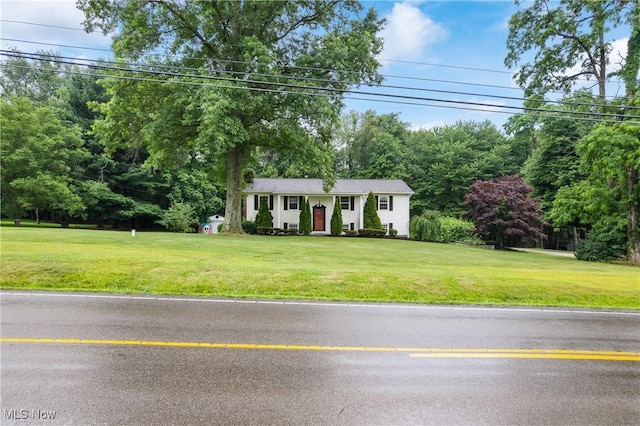 254 Eastern Rd, Doylestown, OH 44230 - view of front of property featuring a front yard and view of wooded area