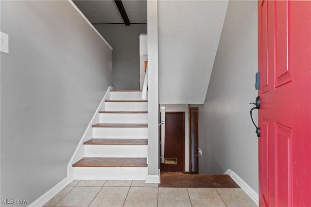 254 Eastern Rd, Doylestown, OH 44230 - stairway with tile patterned floors and baseboards