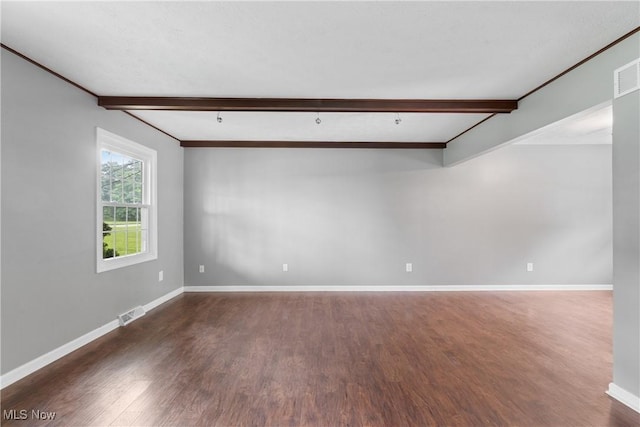 254 Eastern Rd, Doylestown, OH 44230 - empty room with beamed ceiling and wood finished floors