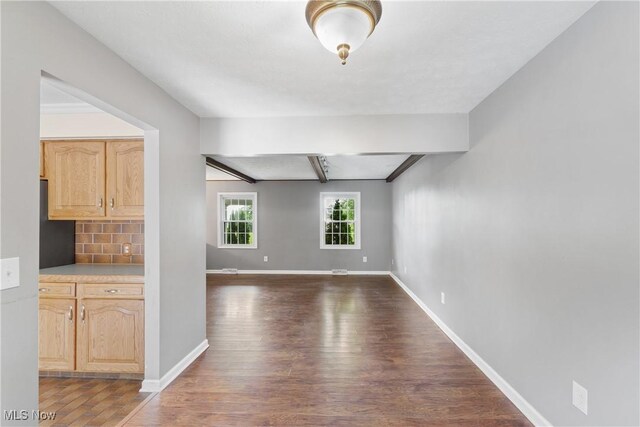 254 Eastern Rd, Doylestown, OH 44230 - unfurnished living room with wood finished floors and beamed ceiling