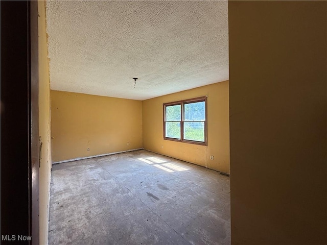3066 State Route 7 N, Pierpont, OH 44082 - empty room featuring a textured ceiling