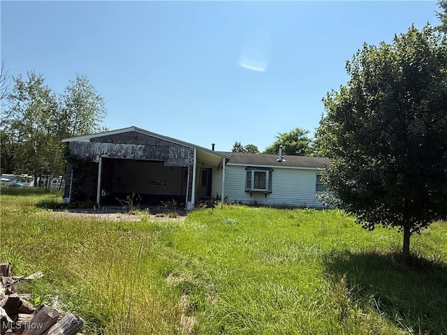 3066 State Route 7 N, Pierpont, OH 44082 - rear view of house with an attached garage