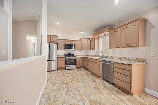 11801 Quail Crest Ave, Mantua, OH 44255 - kitchen with appliances with stainless steel finishes, lofted ceiling, light brown cabinets, light marble finish floors, and light stone countertops