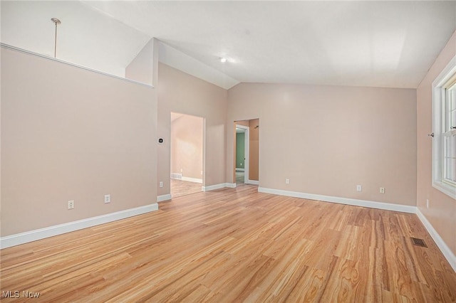 11801 Quail Crest Ave, Mantua, OH 44255 - spare room with lofted ceiling and light wood-type flooring