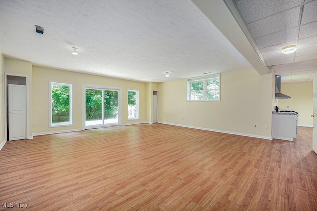 11801 Quail Crest Ave, Mantua, OH 44255 - unfurnished room with light wood-style flooring and baseboards