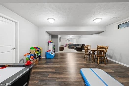1932 Pinewood Ln, Painesville, OH 44077 - rec room featuring wood finished floors, a textured ceiling, and billiards table