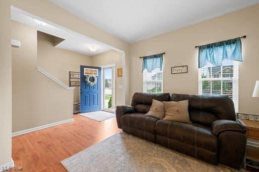 1932 Pinewood Ln, Painesville, OH 44077 - living room with wood finished floors and baseboards