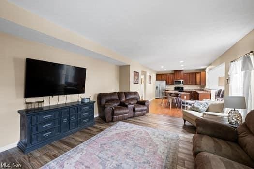 1932 Pinewood Ln, Painesville, OH 44077 - living area featuring wood finished floors and recessed lighting