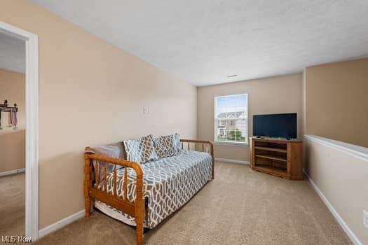 1932 Pinewood Ln, Painesville, OH 44077 - sitting room with carpet flooring