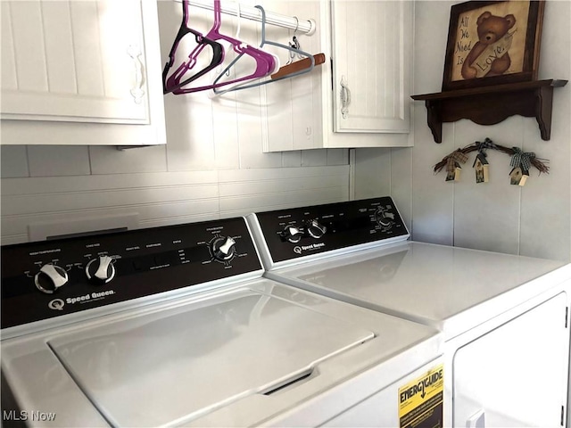 1229 Columbiana Lisbon Rd Unit 104, Columbiana, OH 44408 - laundry room with washing machine and clothes dryer and cabinet space