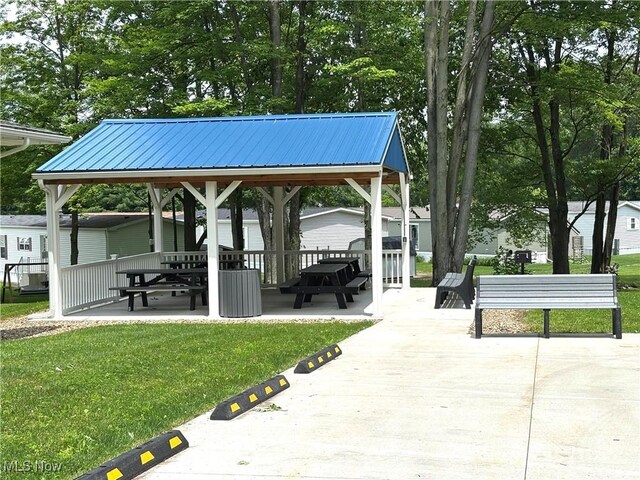 1229 Columbiana Lisbon Rd Unit 104, Columbiana, OH 44408 - view of home's community with a lawn, a gazebo, and a patio
