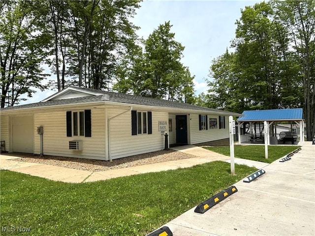 1229 Columbiana Lisbon Rd Unit 104, Columbiana, OH 44408 - single story home with a front yard and a gazebo