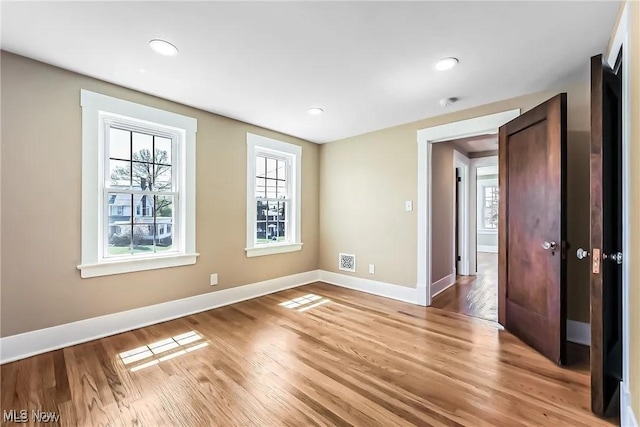 1348 W Erie Ave, Lorain, OH 44052 - empty room with light wood-style flooring and recessed lighting