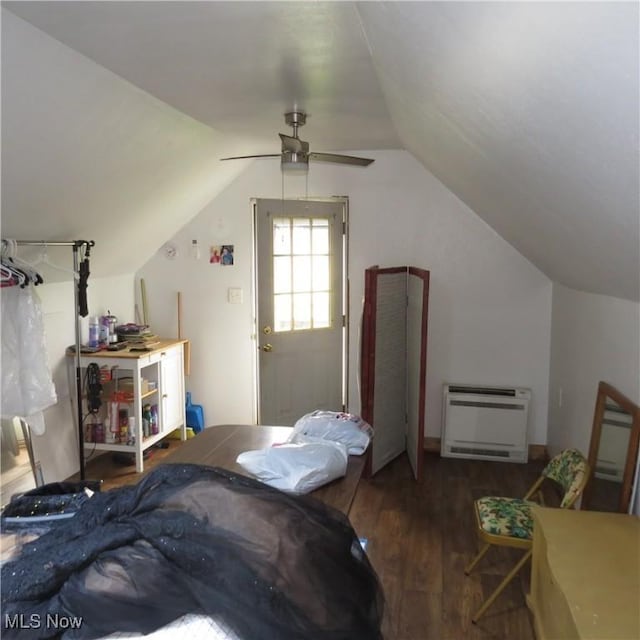 4018 Steubenville Rd SE, Amsterdam, OH 43903 - bedroom with heating unit, wood finished floors, vaulted ceiling, and a ceiling fan