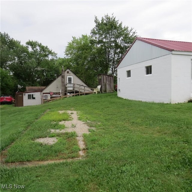 4018 Steubenville Rd SE, Amsterdam, OH 43903 - view of green lawn with a storage shed