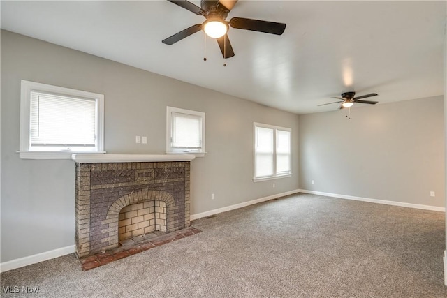 12826 Harvard Ave, Cleveland, OH 44105 - unfurnished living room with ceiling fan, carpet floors, and a fireplace