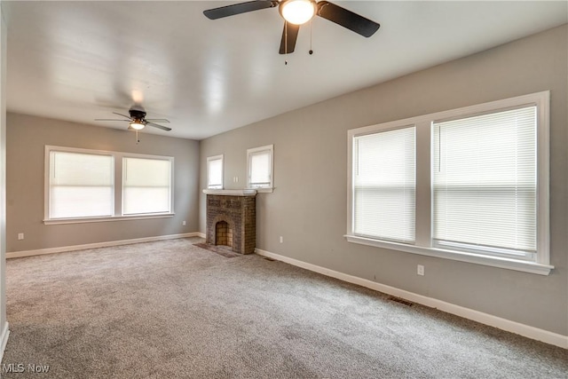 12826 Harvard Ave, Cleveland, OH 44105 - unfurnished living room with ceiling fan, carpet flooring, and a fireplace