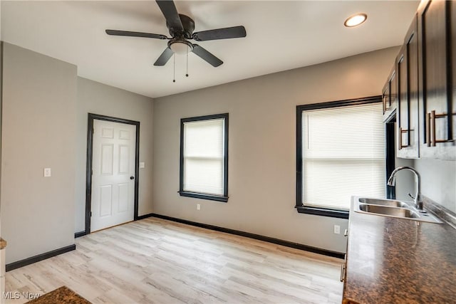 12826 Harvard Ave, Cleveland, OH 44105 - unfurnished dining area with light wood-style flooring, ceiling fan, and recessed lighting