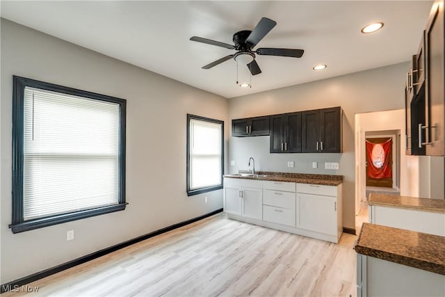 12826 Harvard Ave, Cleveland, OH 44105 - kitchen with light wood-style floors, ceiling fan, and recessed lighting