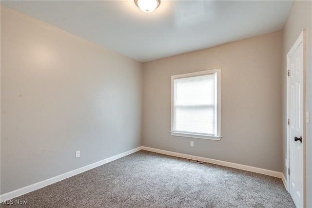 12826 Harvard Ave, Cleveland, OH 44105 - carpeted empty room featuring baseboards