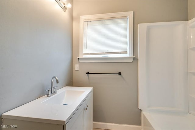 12826 Harvard Ave, Cleveland, OH 44105 - bathroom featuring vanity and a shower