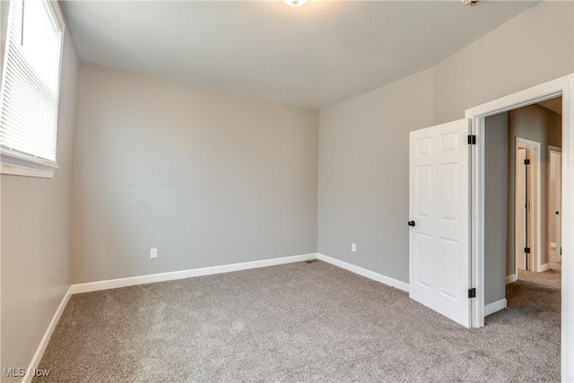 12826 Harvard Ave, Cleveland, OH 44105 - carpeted spare room with baseboards