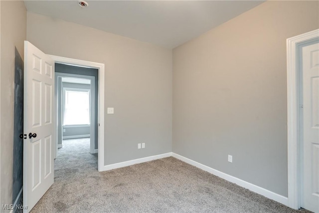 12826 Harvard Ave, Cleveland, OH 44105 - spare room featuring baseboards and carpet flooring