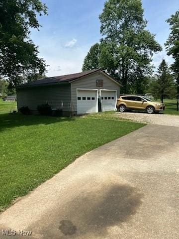 66421 Wolfs Den Rd, Cambridge, OH 43725 - detached garage featuring driveway