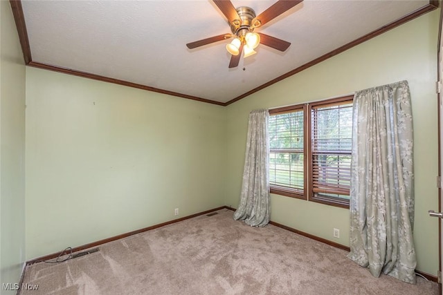 19 Pageant Ln, Olmsted Twp, OH 44138 - spare room with vaulted ceiling, carpet flooring, ceiling fan, and ornamental molding