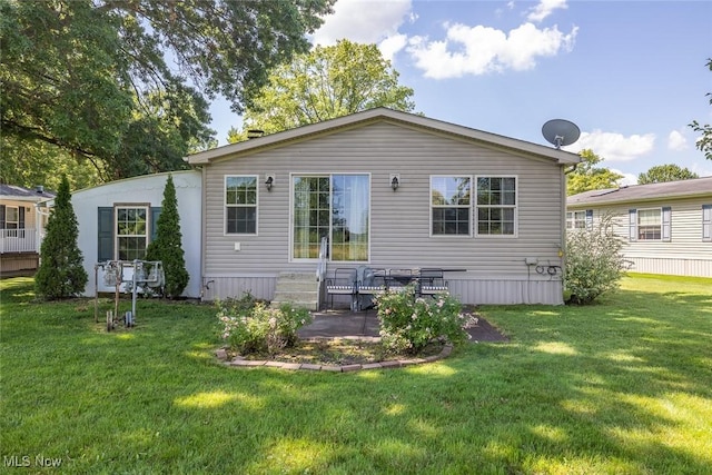 19 Pageant Ln, Olmsted Twp, OH 44138 - rear view of house with a yard, a patio area, and entry steps