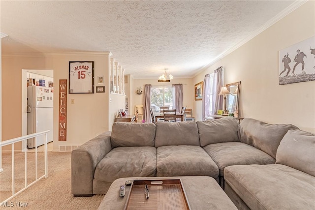 530 N Scranton St, Ravenna, OH 44266 - living room with a chandelier, light carpet, crown molding, and a textured ceiling