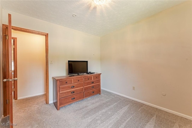 530 N Scranton St, Ravenna, OH 44266 - bedroom featuring light colored carpet and a textured ceiling