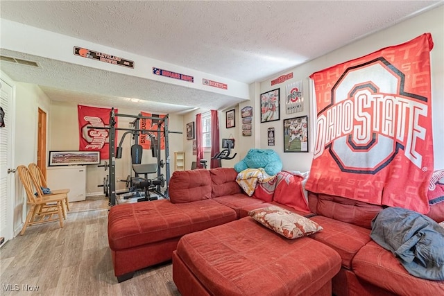 530 N Scranton St, Ravenna, OH 44266 - living room with a textured ceiling and wood finished floors