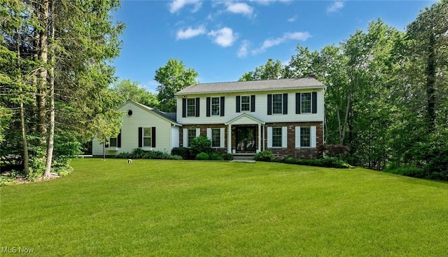 1593 Stonington Dr, Hudson, OH 44236 - colonial-style house featuring a front yard and brick siding