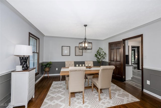 1593 Stonington Dr, Hudson, OH 44236 - dining room featuring crown molding, a chandelier, wainscoting, and wood finished floors