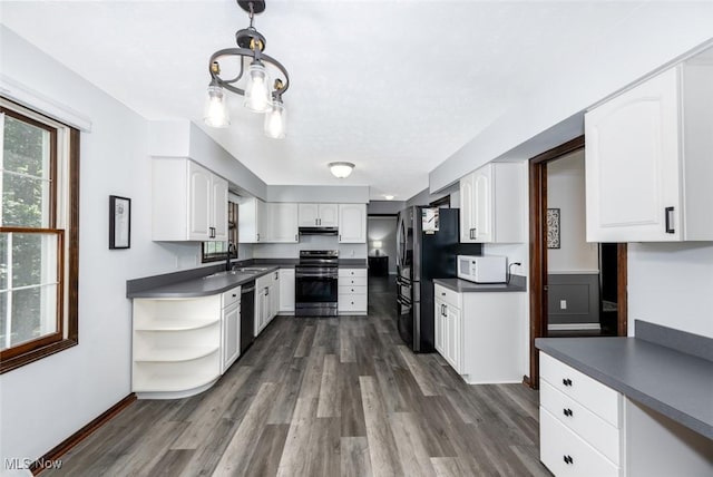 1593 Stonington Dr, Hudson, OH 44236 - kitchen featuring appliances with stainless steel finishes, open shelves, dark countertops, and dark wood-style flooring