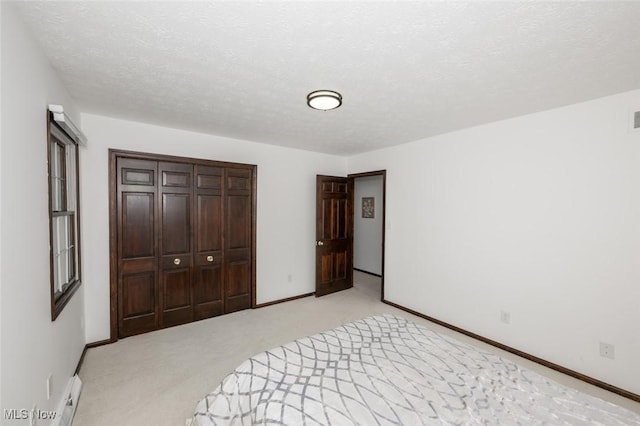 1593 Stonington Dr, Hudson, OH 44236 - unfurnished bedroom with a closet, light colored carpet, and a textured ceiling