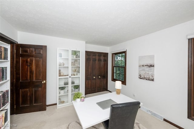 1593 Stonington Dr, Hudson, OH 44236 - office area with light colored carpet and a textured ceiling