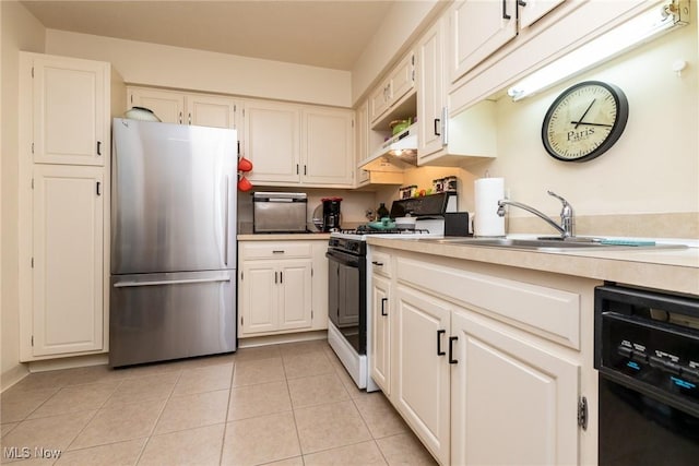 2112 Acacia Park Dr Unit 220, Lyndhurst, OH 44124 - kitchen with freestanding refrigerator, gas range, dishwasher, light countertops, and white cabinetry
